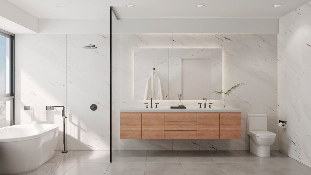 a-bathroom-with-a-tub-sink-and-mirror-yg8zkwbs30q